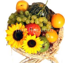 Cestino di frutta fresca di stagione e girasoli