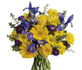 Bouquet con iris blu, rose gialle e gerbere gialle con verde decorativo